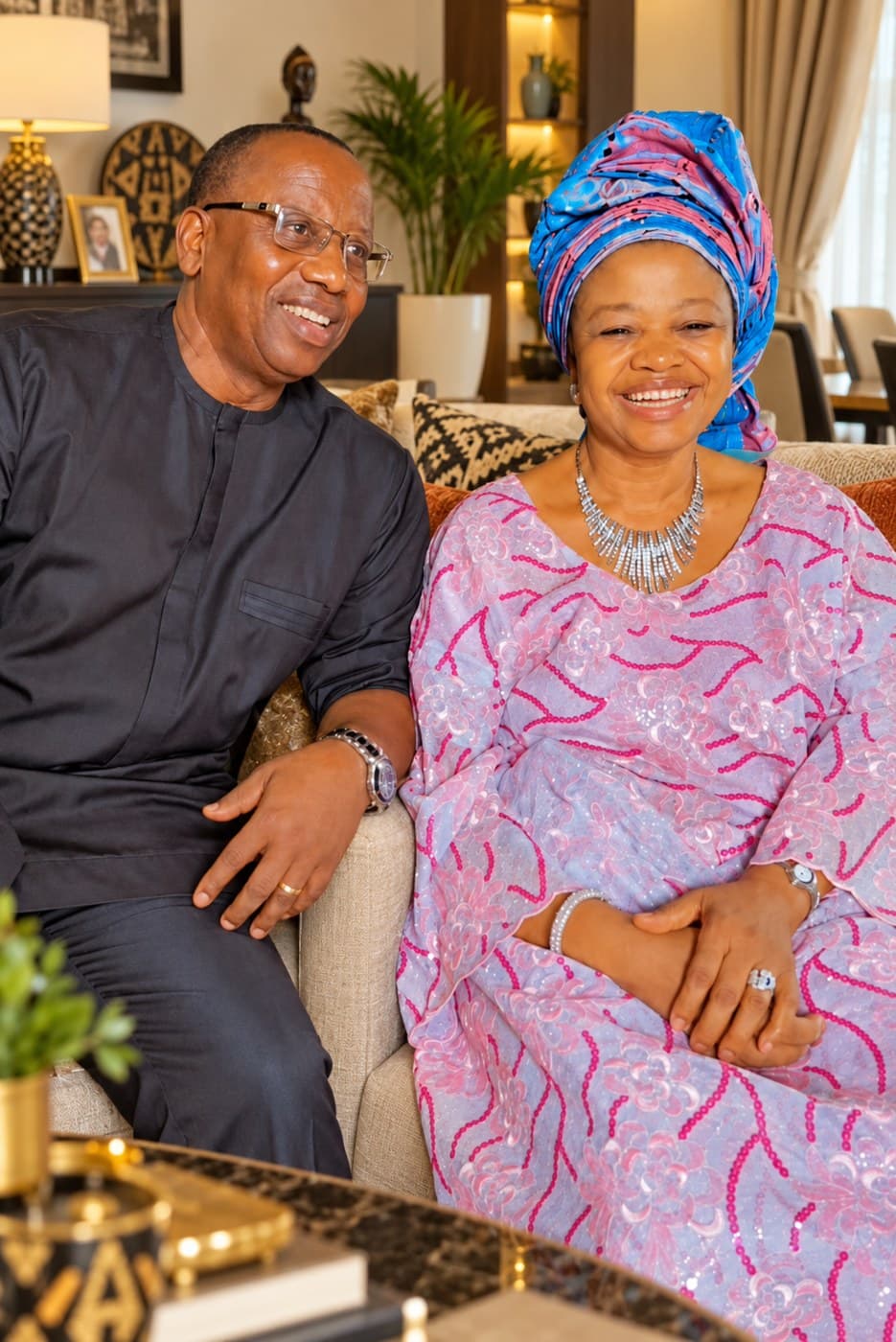 Her brother seated beside Mrs. Joy Onyechi Egbo, both smiling