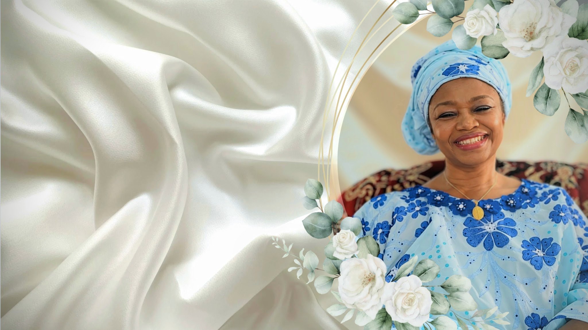 Mrs Egbo smiling in a pale blue and royal blue gown and gele, framed by a gold ring and white roses
